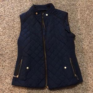 Navy blue quilted vest